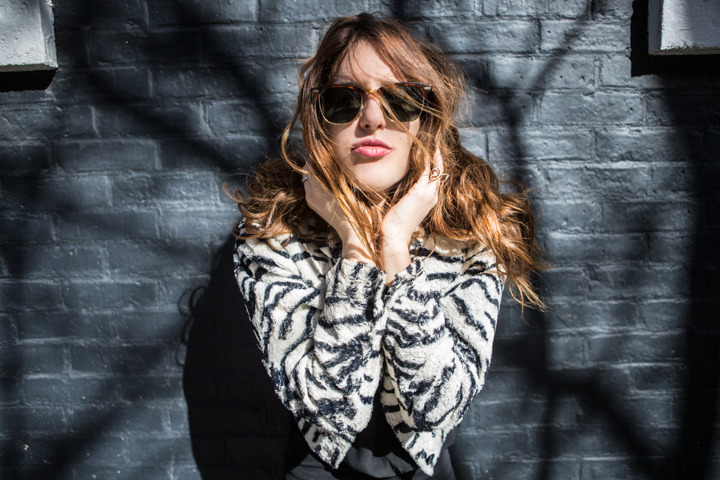 Woman wearing a patterned jacket