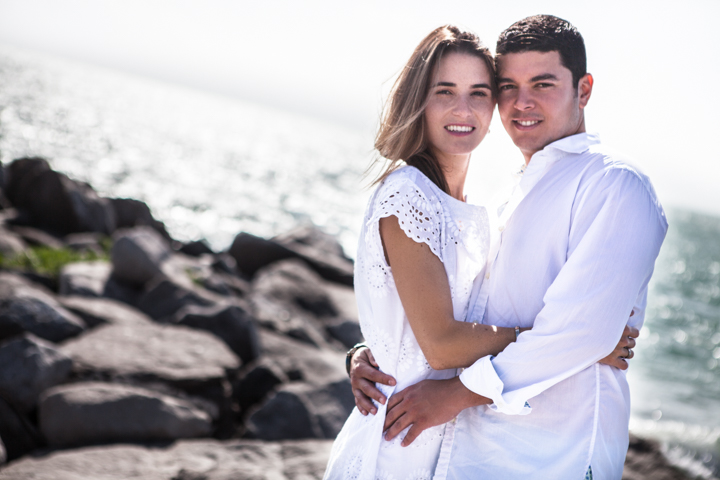 Couple embracing by the sea
