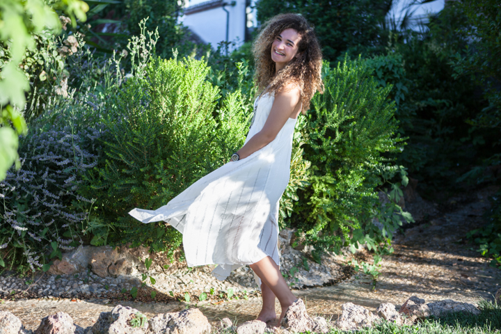 Woman in a sunlit garden